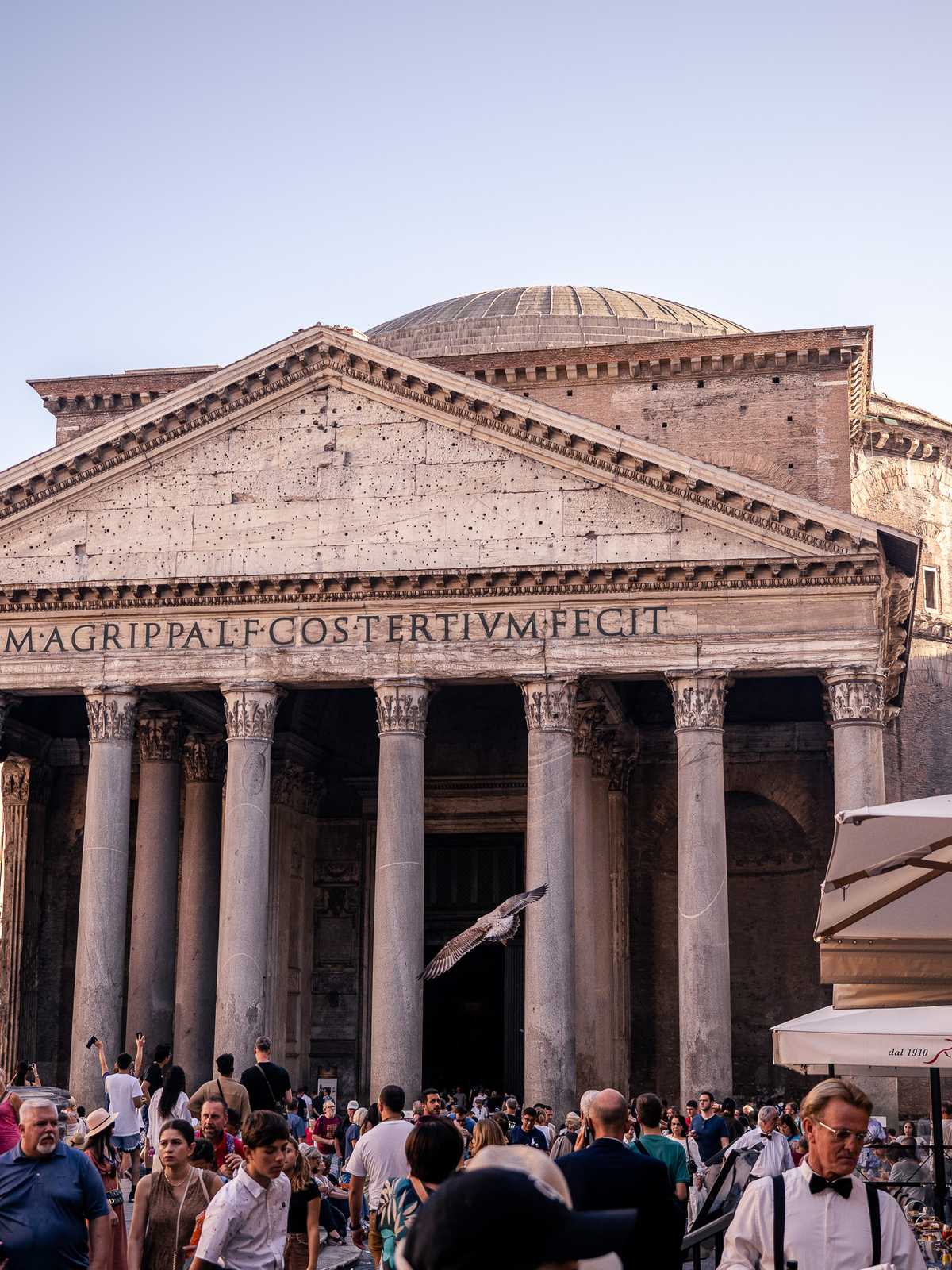 A front facade of a church in Rome, with the dome visible at the top