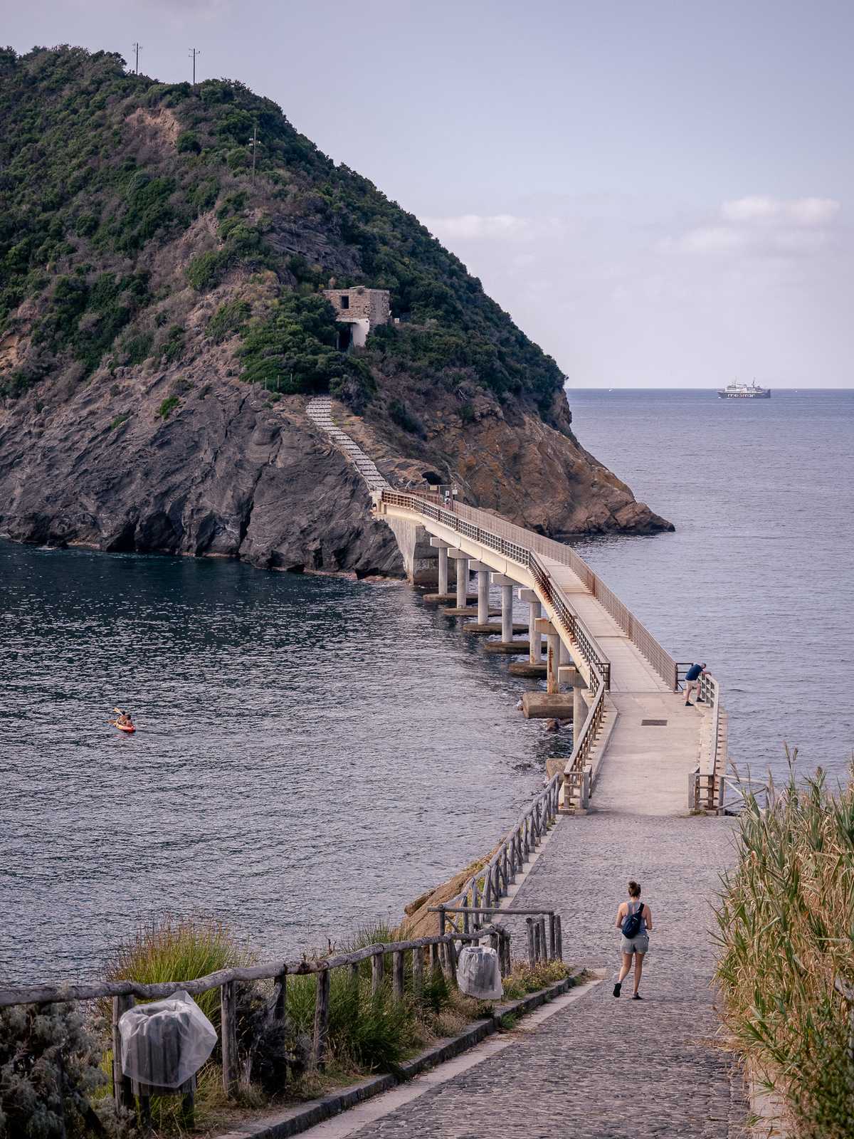 A bridge crosses a bit of ocean between islands